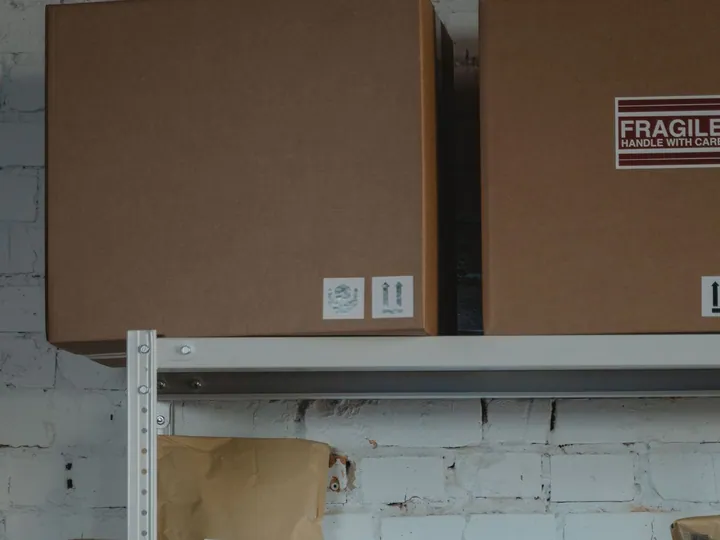 Cardboard packages on industrial shelving
